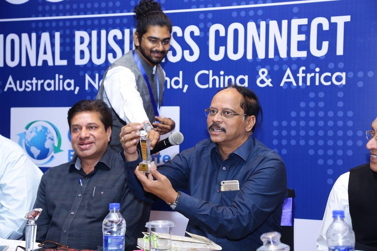 Awardees with trophies at Accelerate International Business Connect